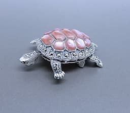 A Marcasite and Pink Mother of Pearl Brooch 1