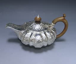 An Antique Silver Tea Pot 1