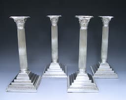 Four George V Sterling Silver Candlesticks 1