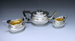 An Edwardian Antique Silver Three-piece Bachelor? Tea Set  1