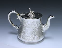 A Victorian Antique Sterling Silver Tea Pot  1