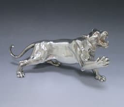 A Silver Model of a Tiger 1