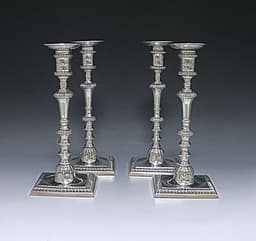 Set of Four George III  Cast Silver Candlesticks  1