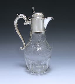 An Antique Silver and Glass Claret Jug 1