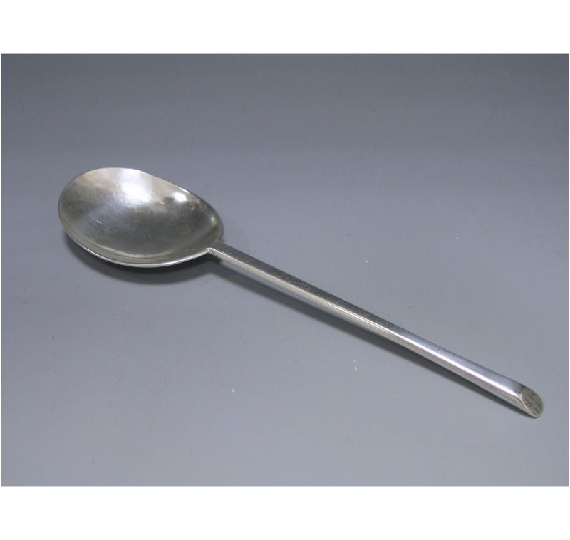 A Commonwealth silver slip" top spoon.