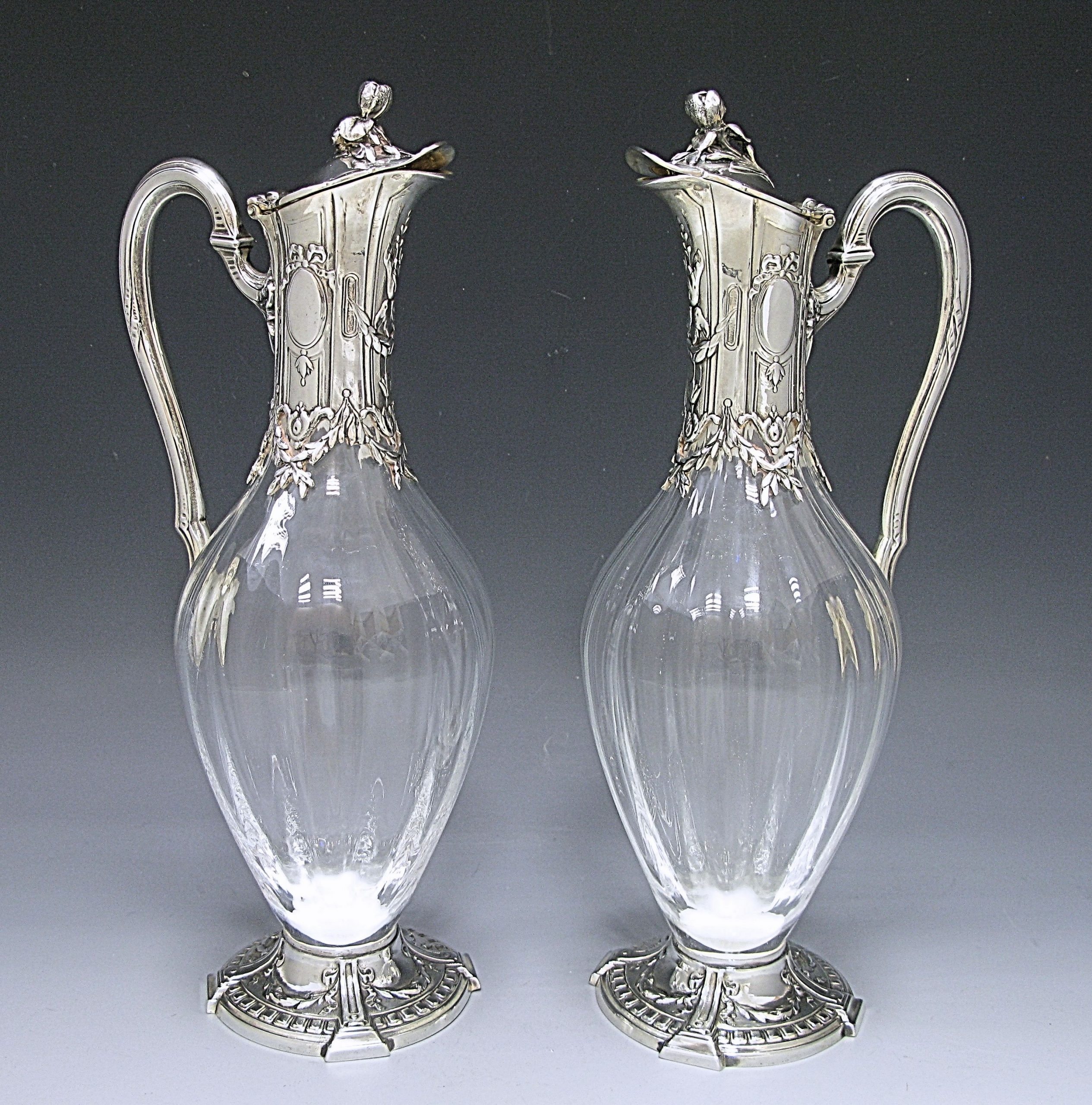 A pair of French Silver Mounted and Glass Claret Jugs 1