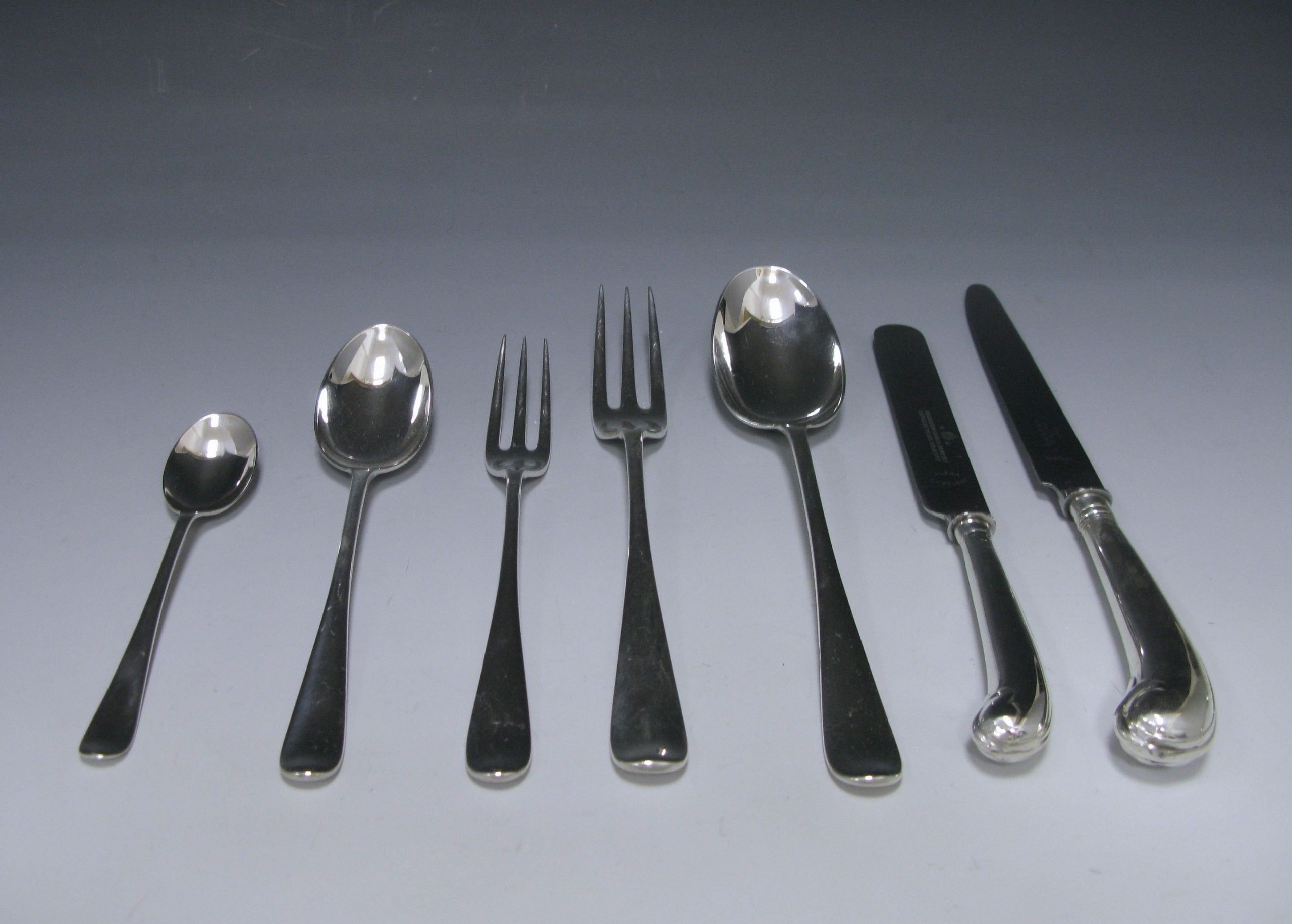 An Antique Silver Hanoverian Rattail Service of Cutlery  1