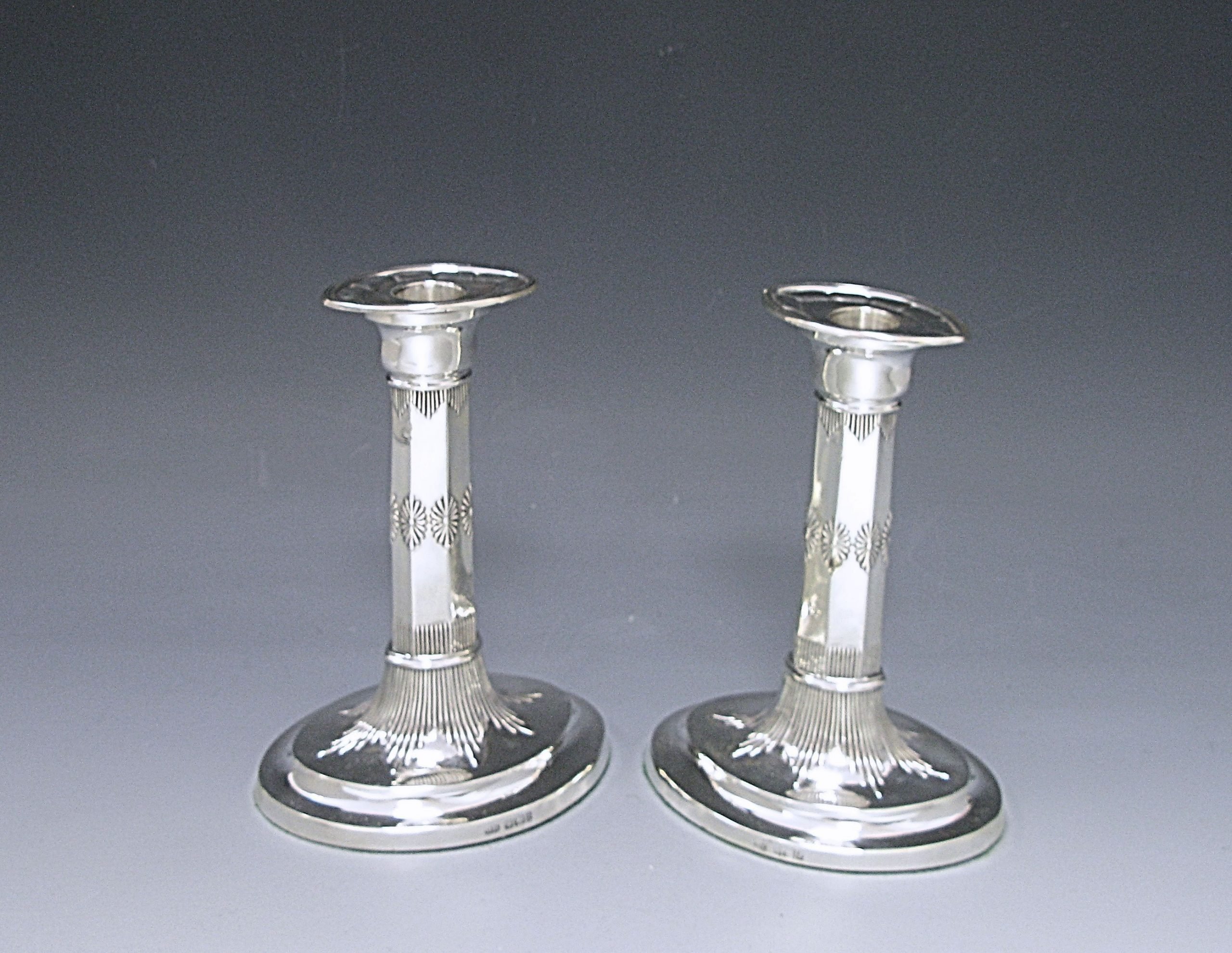 A pair of Edwardian Antique Silver Candlesticks 1