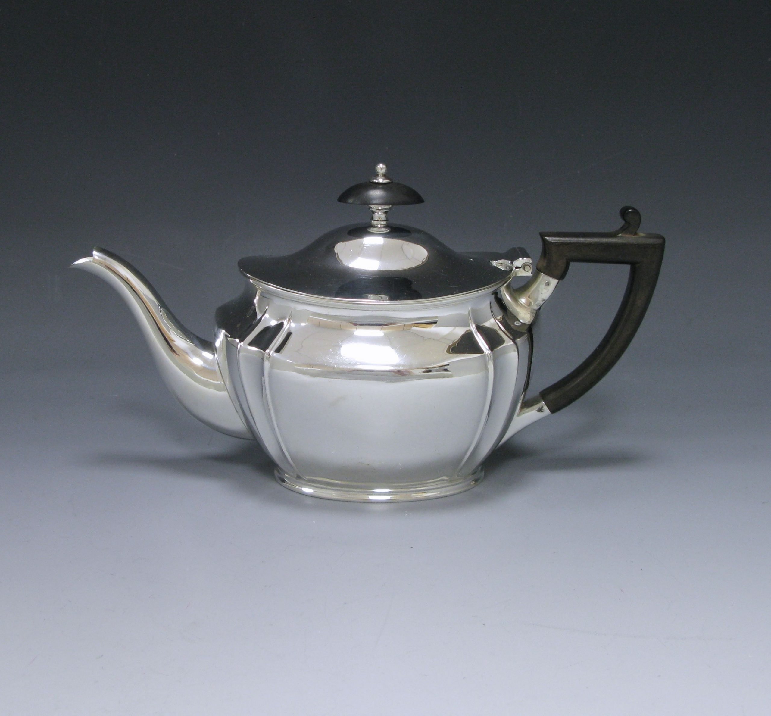 An Antique Silver Bachelor Tea Pot 1
