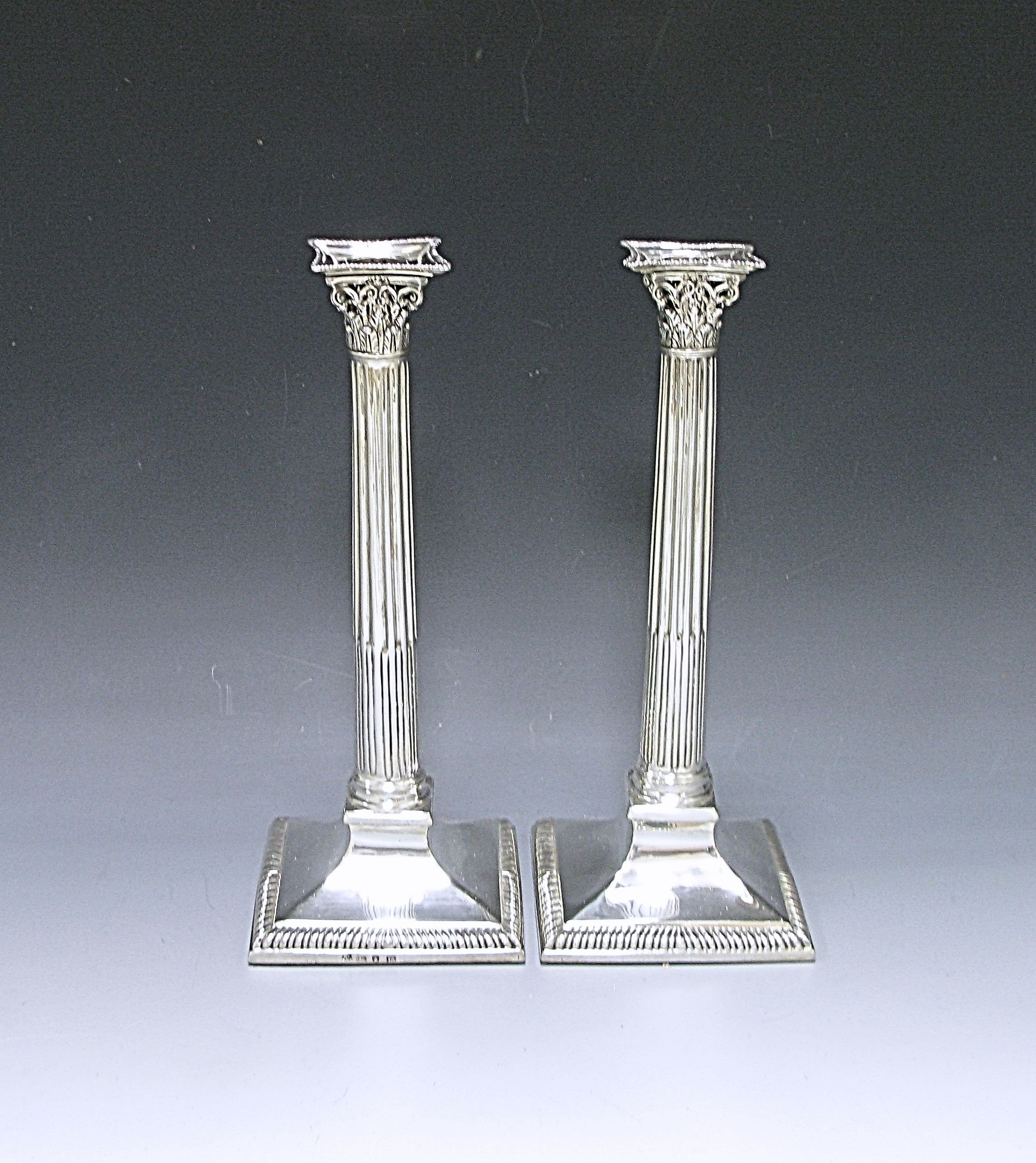 A George III pair of Candlesticks 1