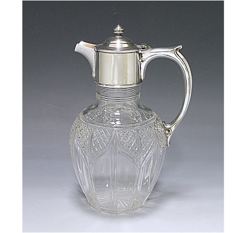 An Edwardian Silver Mounted Claret Jug