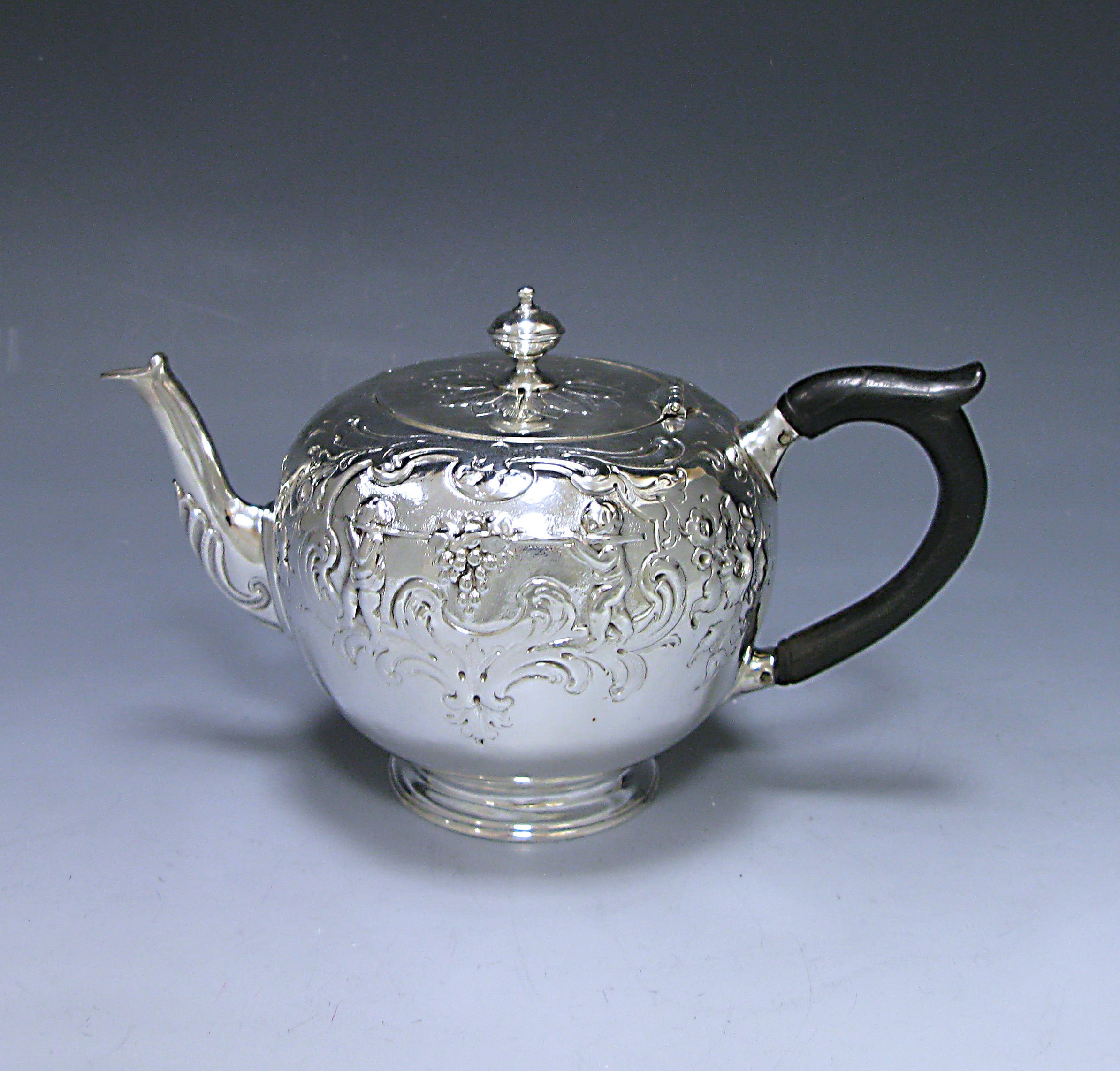 Antique Silver Victorian Chased Bullet Bachelor Tea Pot   1