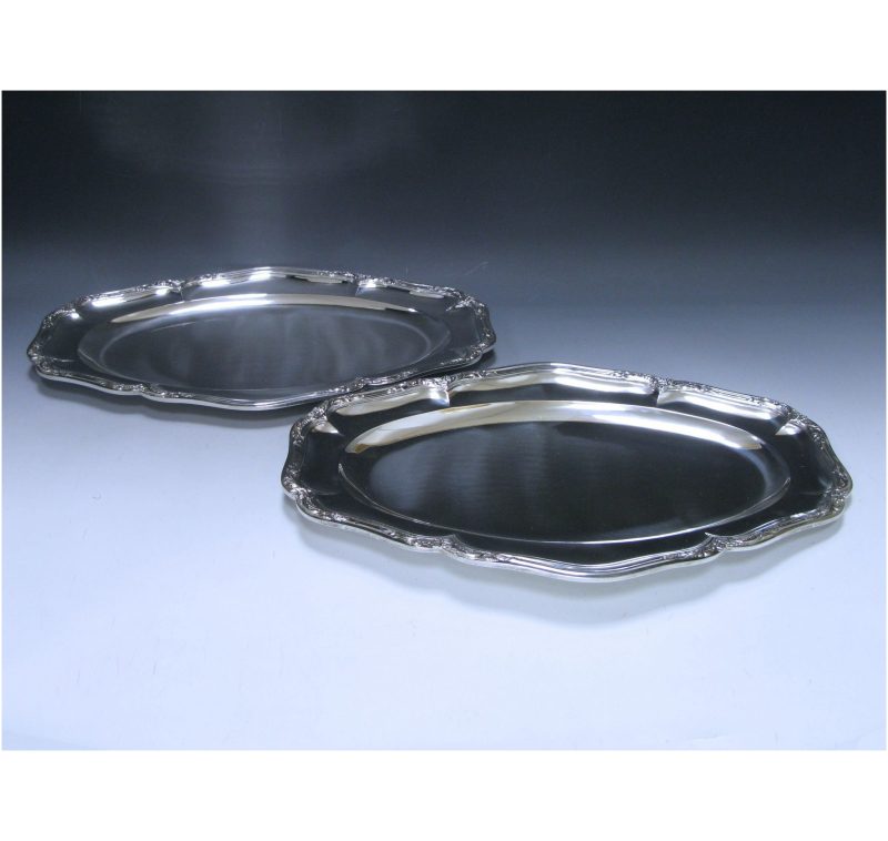 A pair of Antique Silver French Meat Dishes