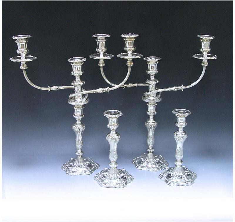 A Suite of George III Antique Silver  three light Candelabra and pair of Candlesticks