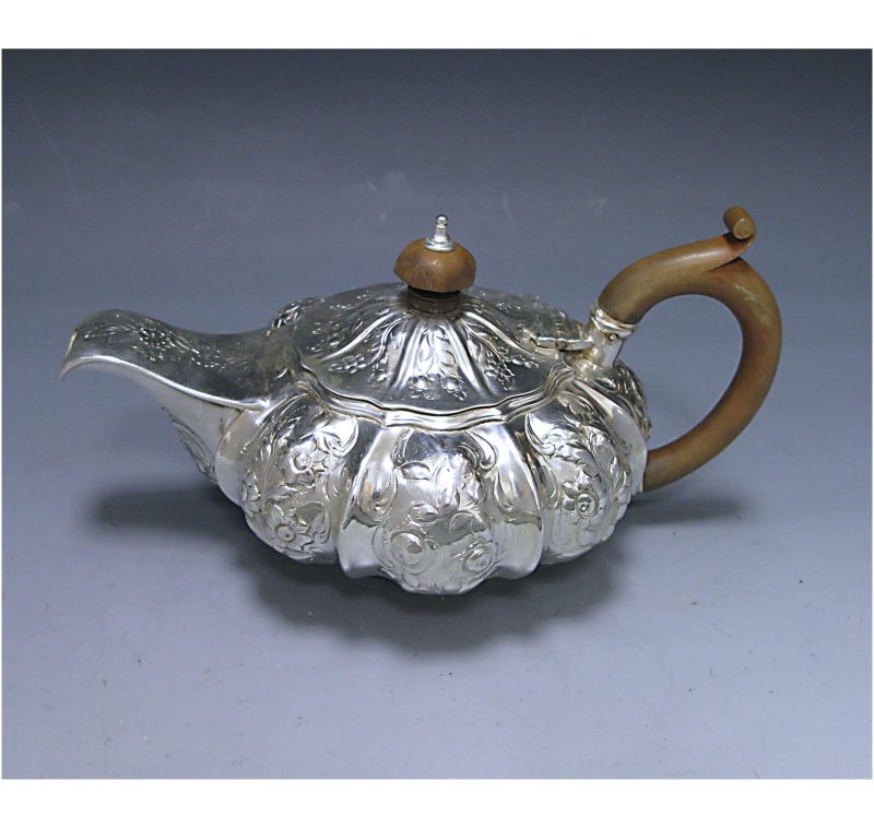 An Antique Silver Tea Pot