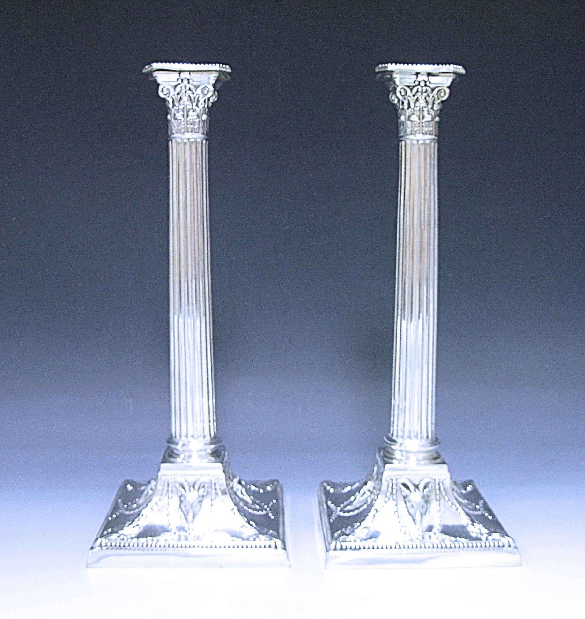 A Pair of Victorian Antique Silver Candlesticks 1