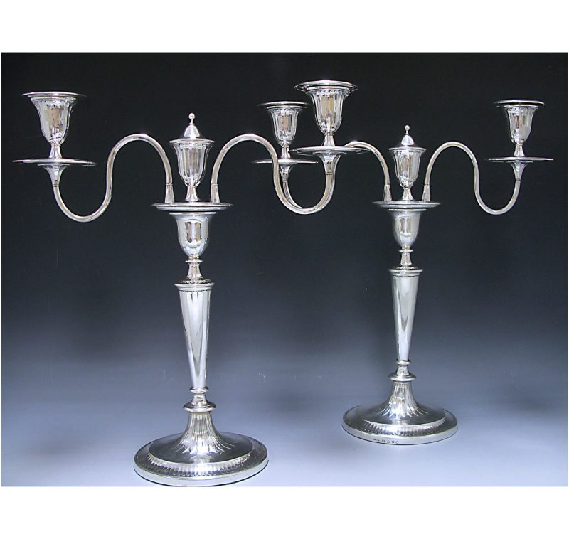 A Pair of George III Silver Candelabra with Old Sheffield Plate Branches