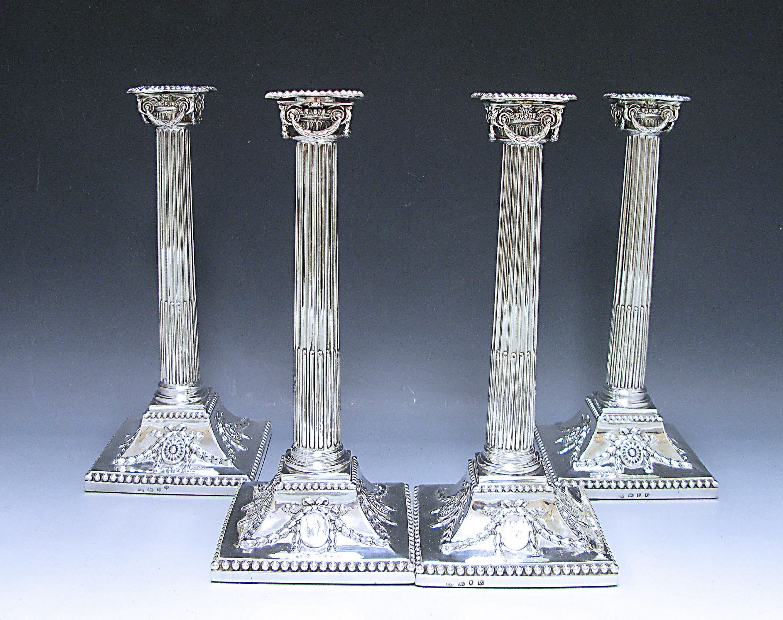 Four Antique George III Silver  Candlesticks 1