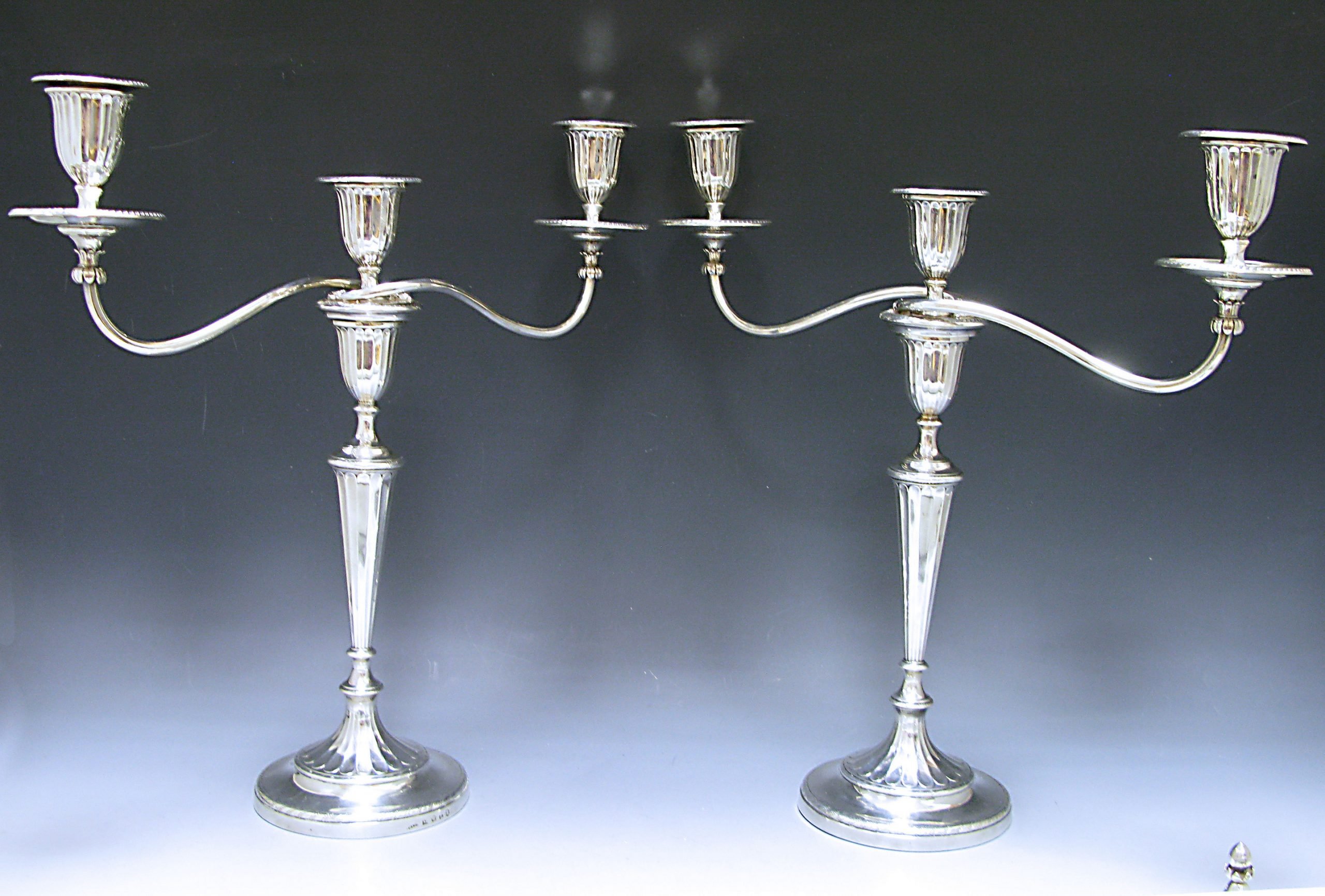 A Pair of George III Sterling Silver three light Candelabra 1