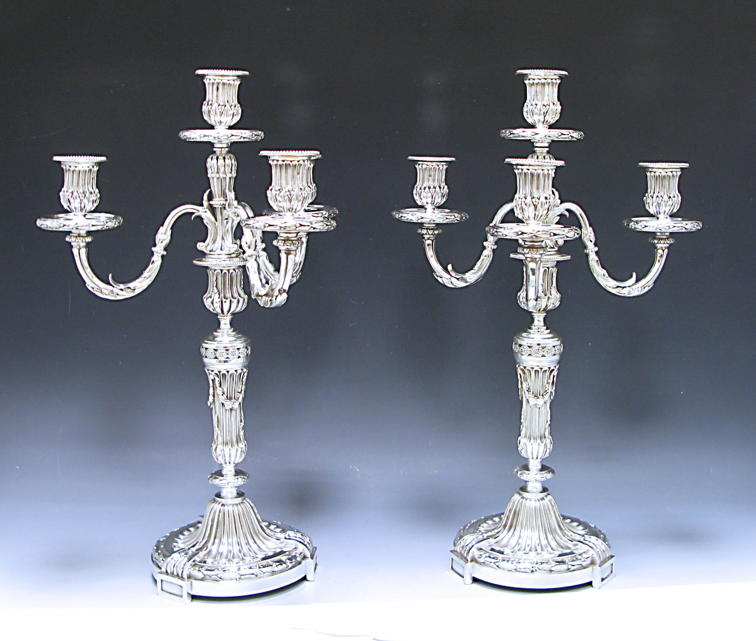 A Pair of French Silver Four- light Candelabra 1