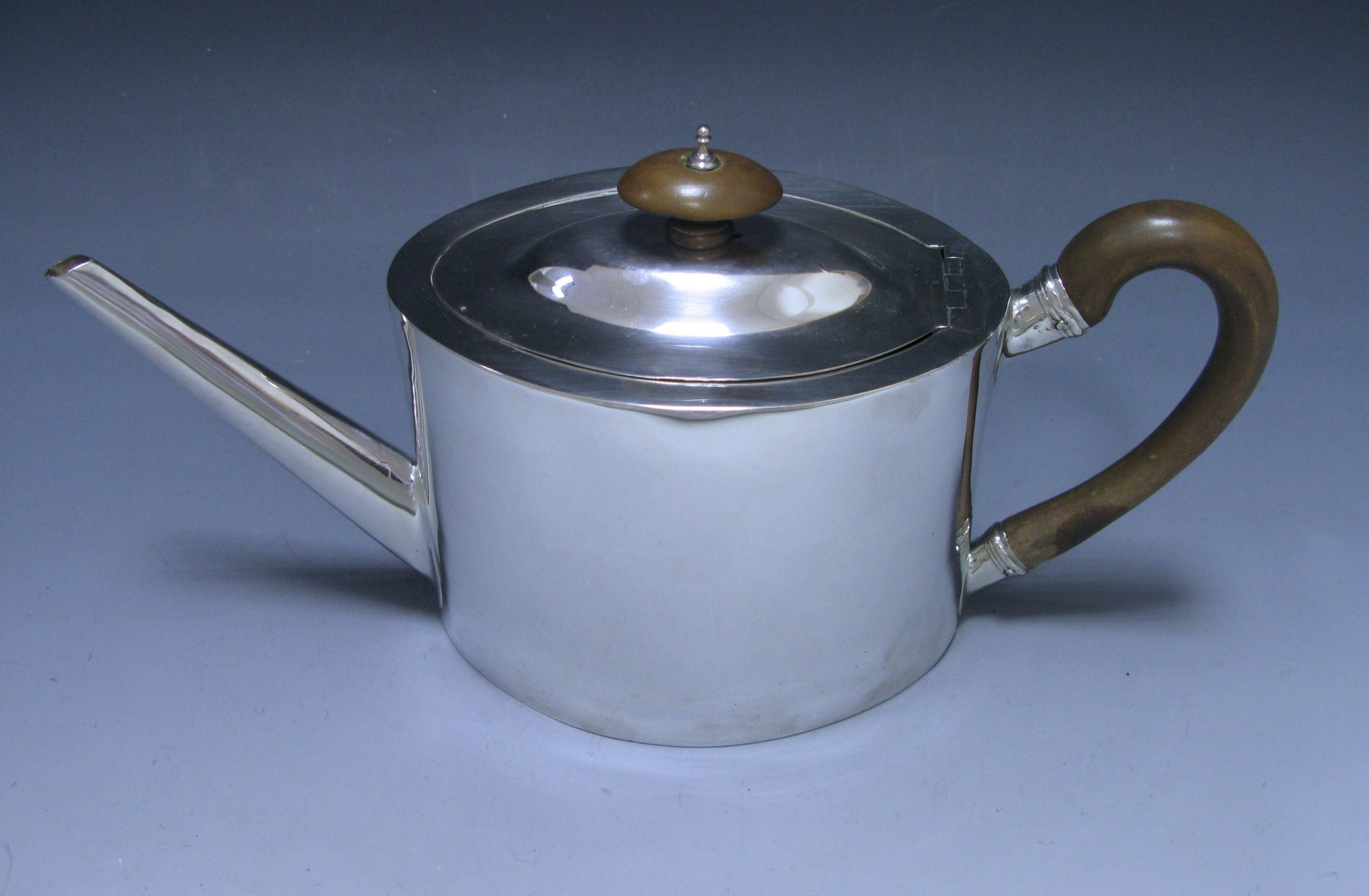 A George III Antique Sterling Silver Teapot 1