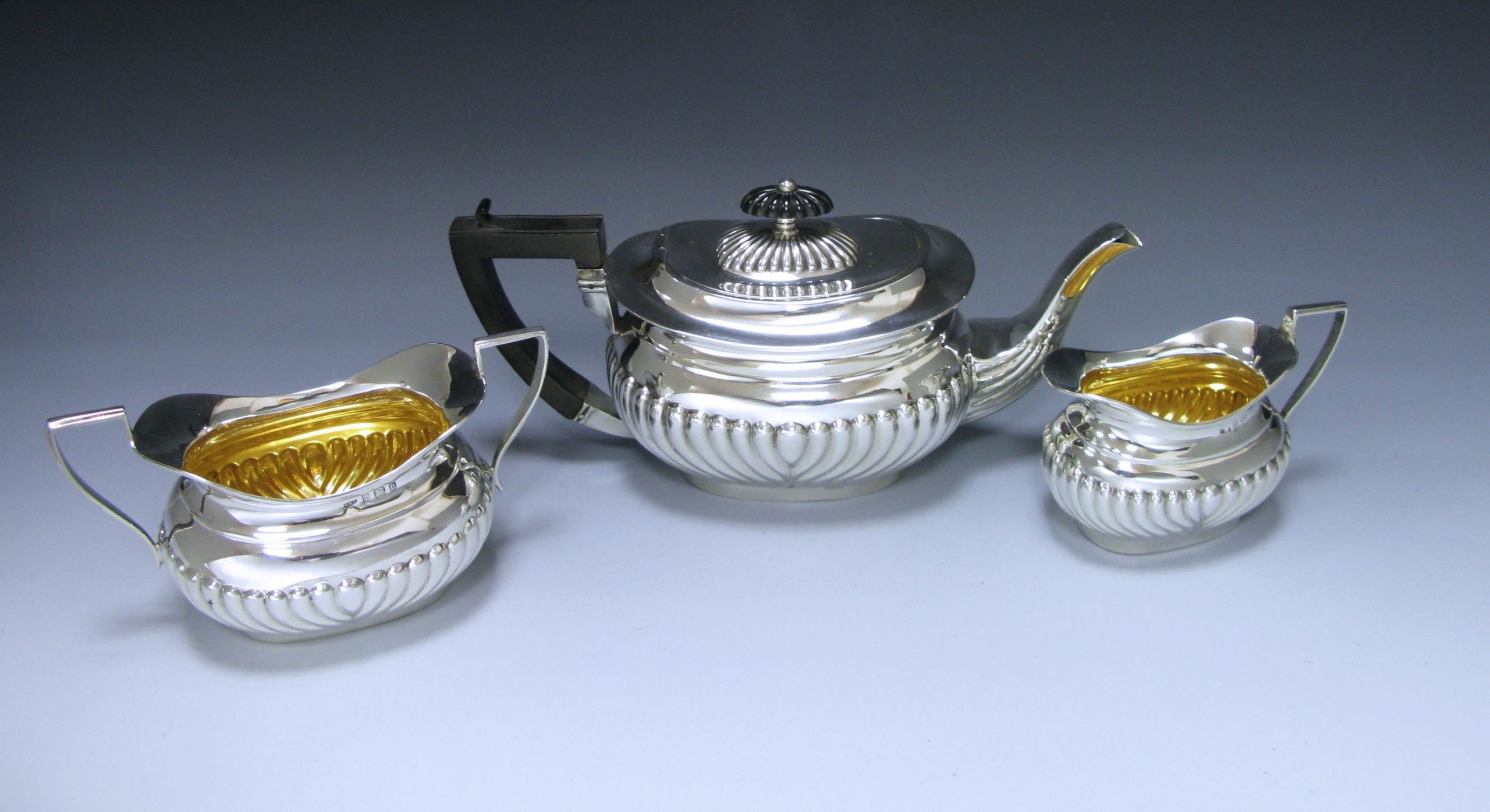 An Edwardian Antique Silver Three-piece Bachelor? Tea Set  1