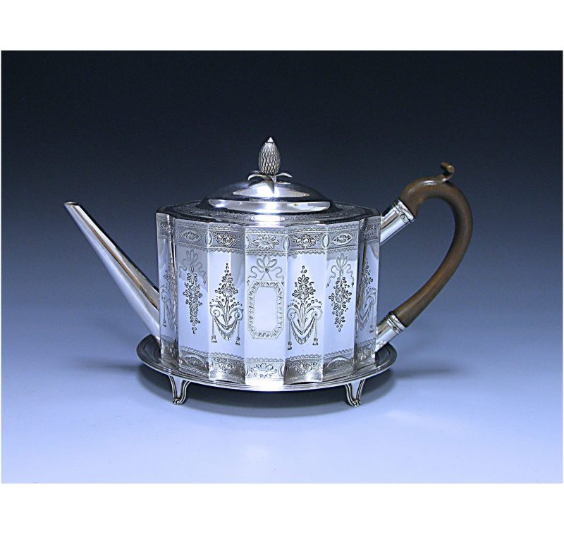 A Sterling Antique Silver Georgian Tea Pot and Stand