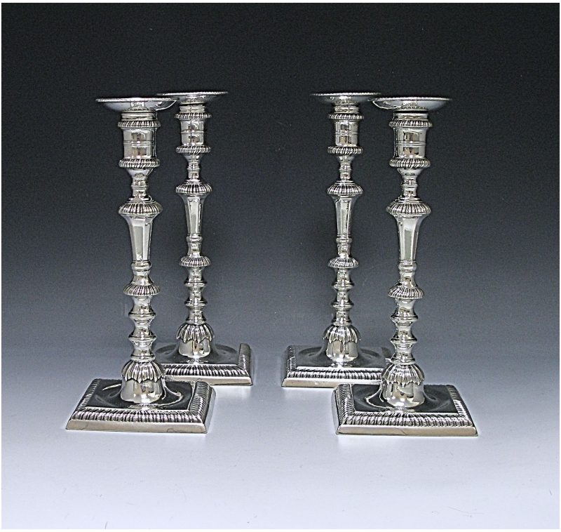 Set of Four George III  Cast Silver Candlesticks