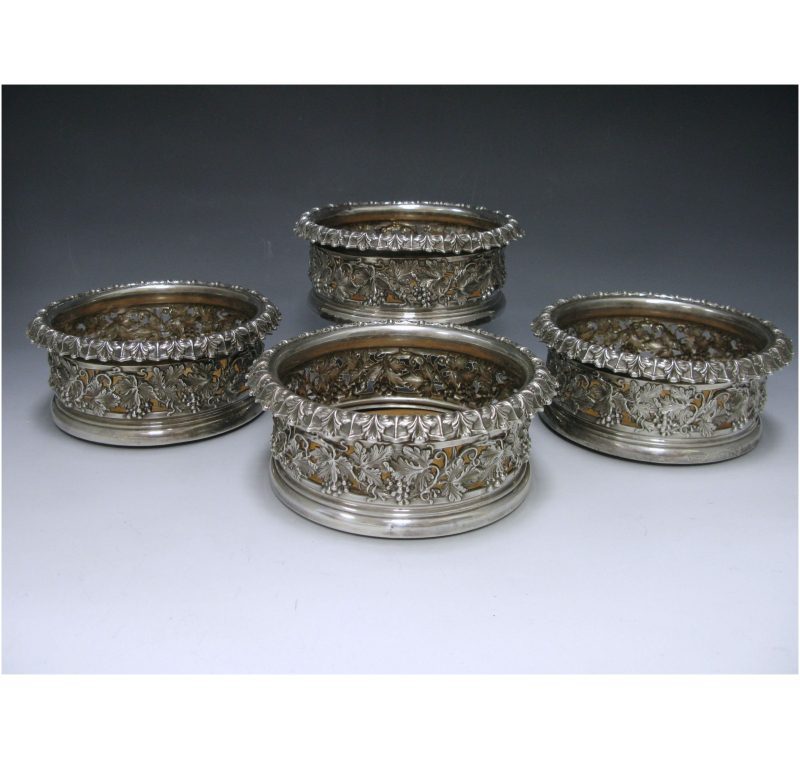 A Set of Four George IV Silver  Wine Coasters