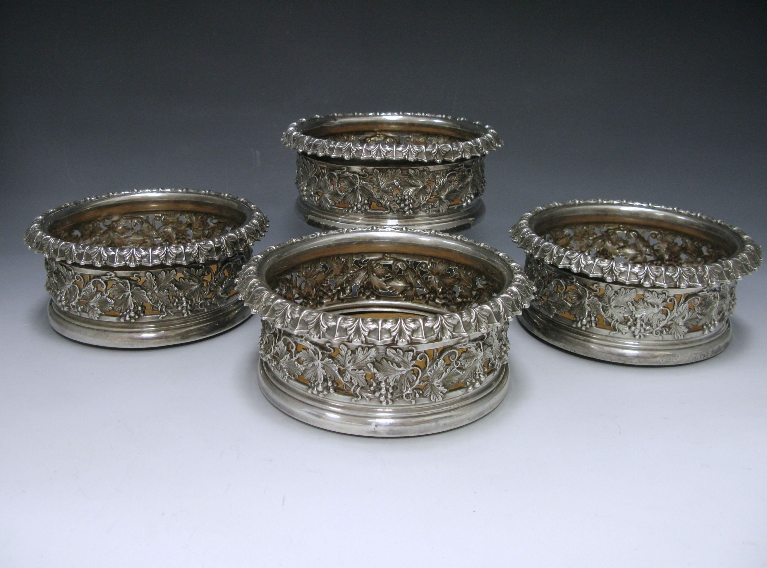 A Set of Four George IV Silver  Wine Coasters 1