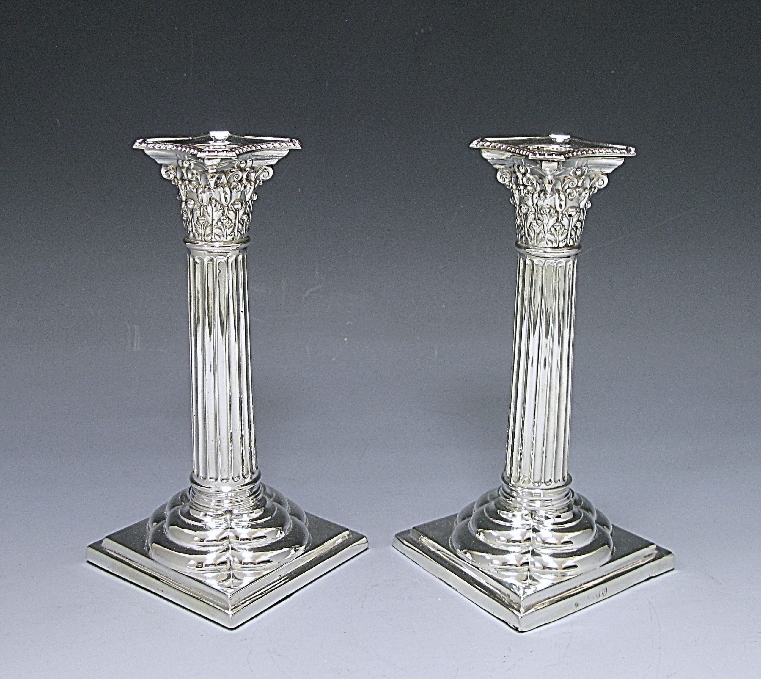 A Pair of Victorian Sterling Silver Candlesticks 1