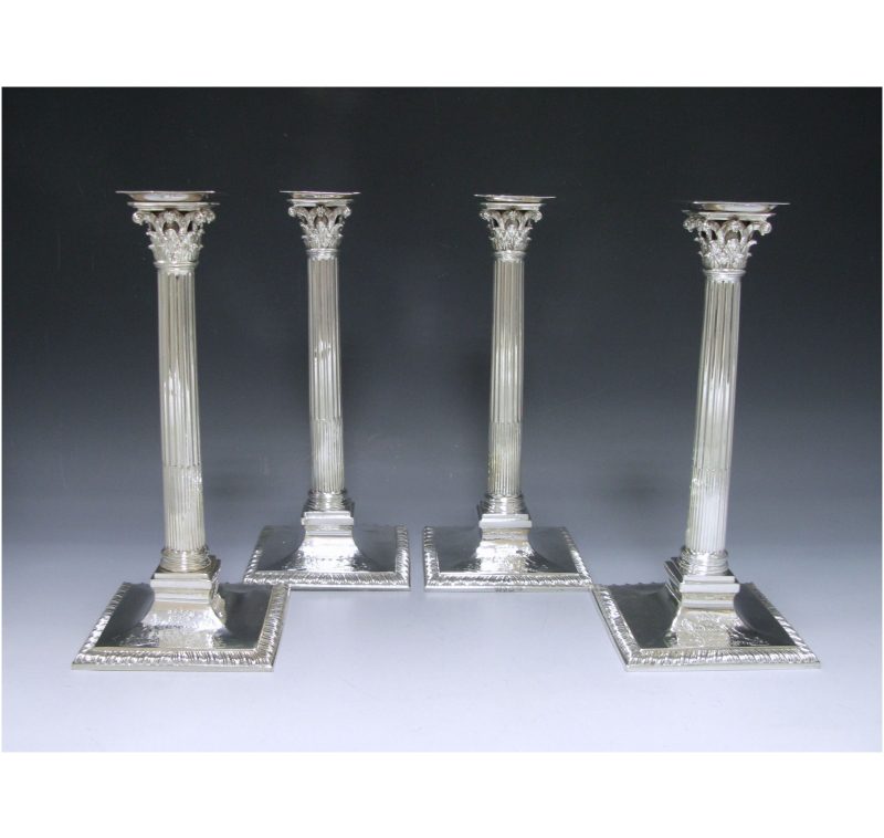 Set of Four George III  Cast Silver Candlesticks