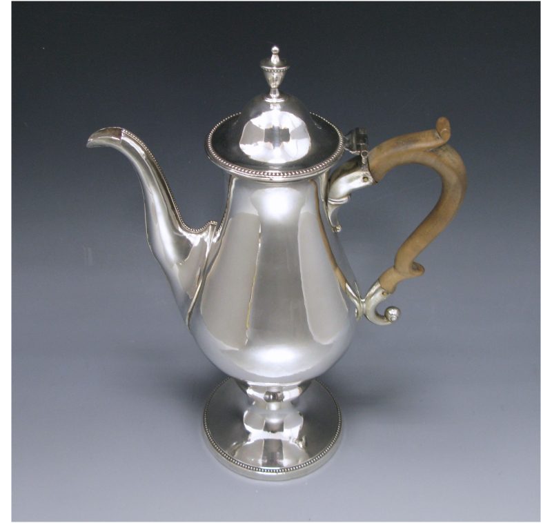 A George III Sheffield Plate coffee pot.