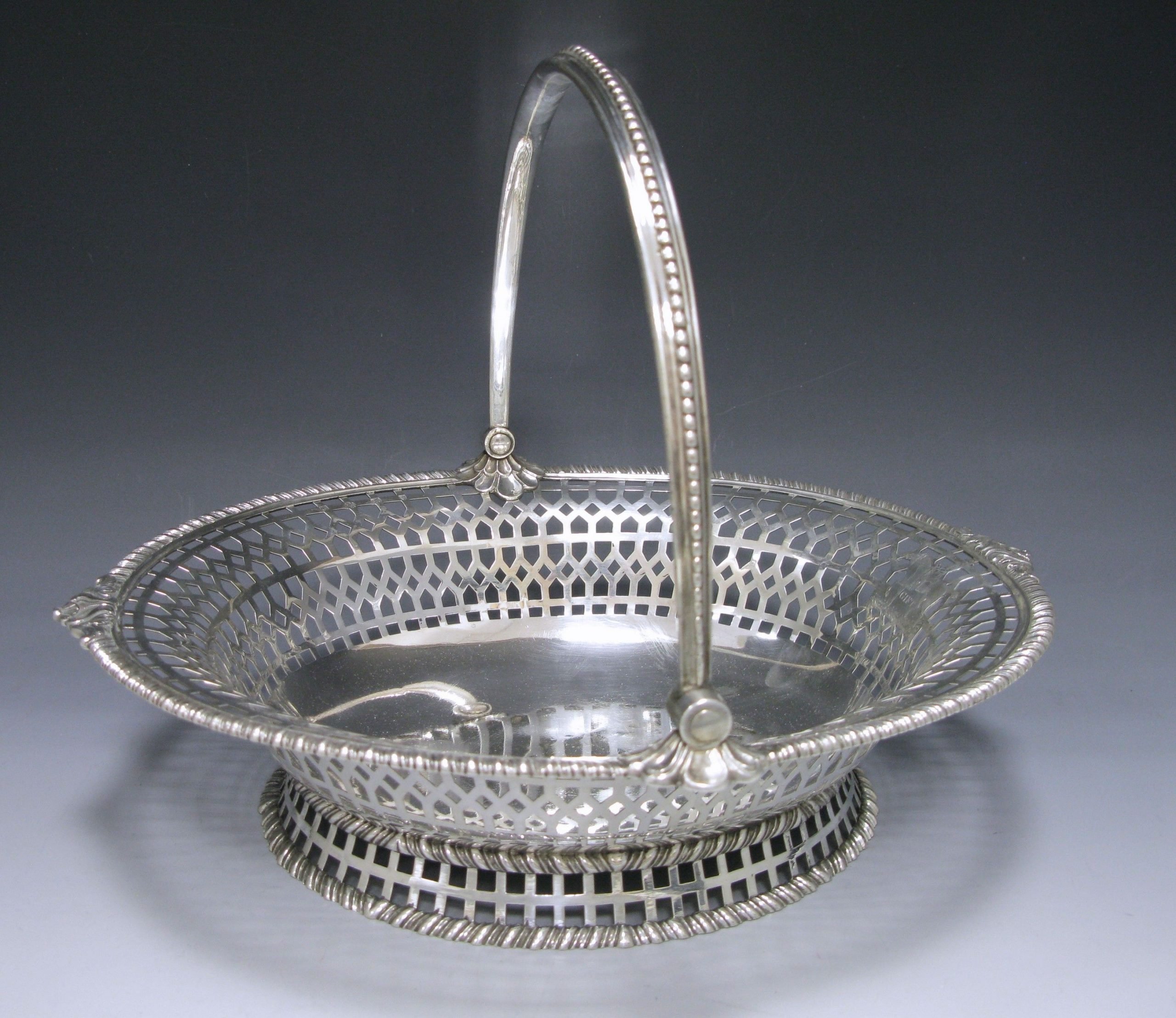 A George III Antique Silver Cake Basket 1